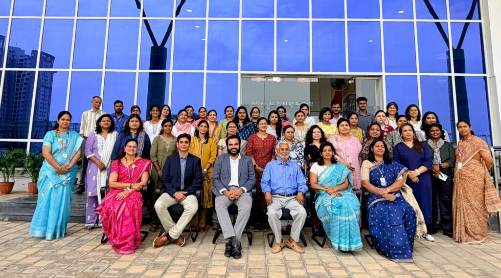 Faculty and management team pose for a group photo during the Teacher Induction Programme at NPS OMR campus.